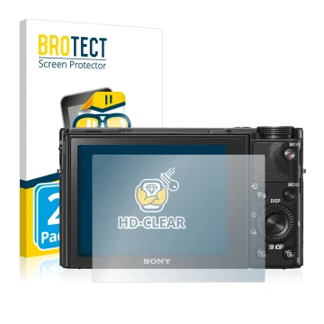 Vorderseite einer Produktverpackung mit dem Markenlogo BROTECT. Daneben ist das Gerät Sony Cyber-Shot DSC-RX100 V mit dem zuge