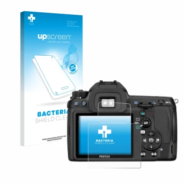 Vorderseite einer Produktverpackung mit dem Markenlogo upscreen. Daneben ist das Gerät Pentax K5, K-5 mit dem zugehörigen Disp