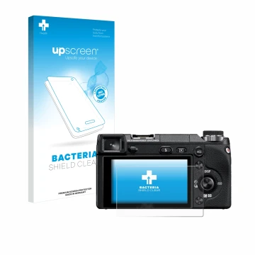 Vorderseite einer Produktverpackung mit dem Markenlogo upscreen. Daneben ist das Gerät Sony Alpha NEX-6 mit dem zugehörigen Di