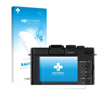Vorderseite einer Produktverpackung mit dem Markenlogo upscreen. Daneben ist das Gerät Leica D-Lux 6 mit dem zugehörigen Displ
