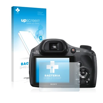 Vorderseite einer Produktverpackung mit dem Markenlogo upscreen. Daneben ist das Gerät Sony Cyber-Shot DSC-HX300 mit dem zugeh