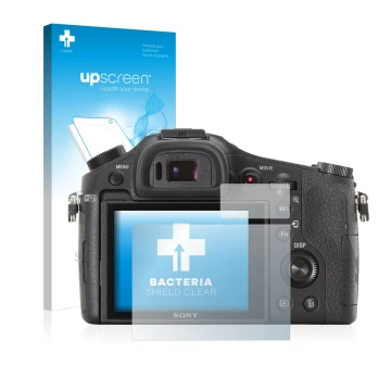 Vorderseite einer Produktverpackung mit dem Markenlogo upscreen. Daneben ist das Gerät Sony Cyber-Shot DSC-RX10 mit dem zugehö