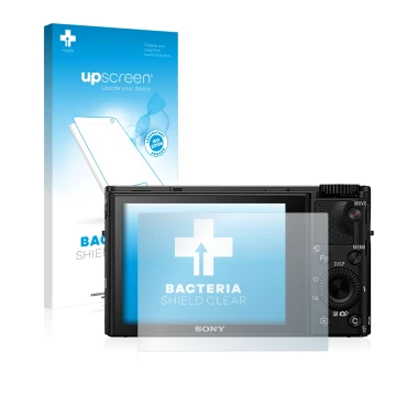 Vorderseite einer Produktverpackung mit dem Markenlogo upscreen. Daneben ist das Gerät Sony Cyber-Shot DSC-RX100 IV mit dem zu