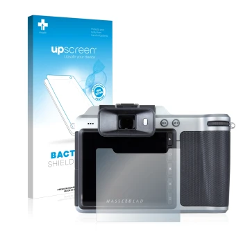 Vorderseite einer Produktverpackung mit dem Markenlogo upscreen. Daneben ist das Gerät Hasselblad X1D-50c mit dem zugehörigen 