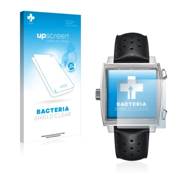 Vorderseite einer Produktverpackung mit dem Markenlogo upscreen. Daneben ist das Gerät TAG Heuer Monaco (39 mm) mit dem zugehö