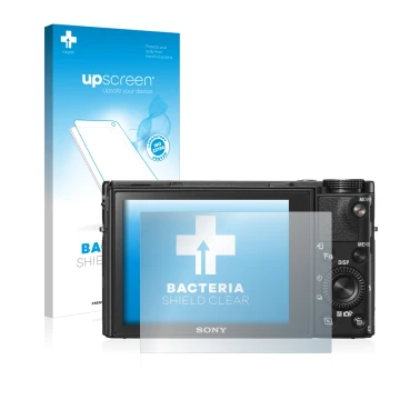Vorderseite einer Produktverpackung mit dem Markenlogo upscreen. Daneben ist das Gerät Sony Cyber-Shot DSC-RX100 VI mit dem zu