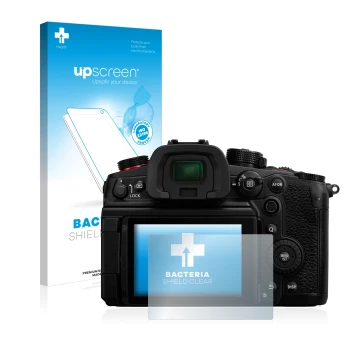 Vorderseite einer Produktverpackung mit dem Markenlogo upscreen. Daneben ist das Gerät Panasonic Lumix DC-GH6 mit dem zugehöri