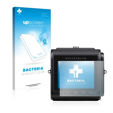 Vorderseite einer Produktverpackung mit dem Markenlogo upscreen. Daneben ist das Gerät Hasselblad 907X 50C mit dem zugehörigen