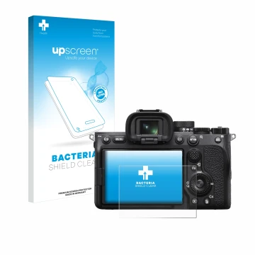Vorderseite einer Produktverpackung mit dem Markenlogo upscreen. Daneben ist das Gerät Sony Alpha 7 IV mit dem zugehörigen Dis
