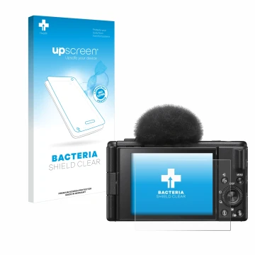 Vorderseite einer Produktverpackung mit dem Markenlogo upscreen. Daneben ist das Gerät Sony ZV-1F mit dem zugehörigen Displays