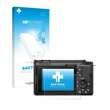 Vorderseite einer Produktverpackung mit dem Markenlogo upscreen. Daneben ist das Gerät Sony Alpha ZV-E1 mit dem zugehörigen Di