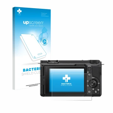 Vorderseite einer Produktverpackung mit dem Markenlogo upscreen. Daneben ist das Gerät Sony Alpha ZV-E10 II mit dem zugehörige