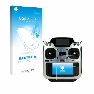 Vorderseite einer Produktverpackung mit dem Markenlogo upscreen. Daneben ist das Gerät Futaba T26SZ mit dem zugehörigen Displa