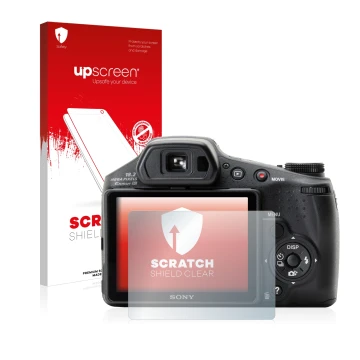 Vorderseite einer Produktverpackung mit dem Markenlogo upscreen. Daneben ist das Gerät Sony Cyber-Shot DSC-HX200V mit dem zuge
