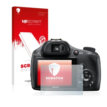 Vorderseite einer Produktverpackung mit dem Markenlogo upscreen. Daneben ist das Gerät Sony Cyber-Shot DSC-HX400V mit dem zuge