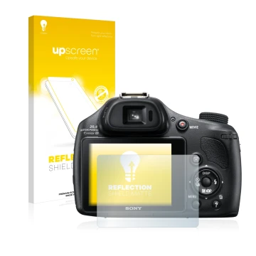 Vorderseite einer Produktverpackung mit dem Markenlogo upscreen. Daneben ist das Gerät Sony Cyber-Shot DSC-HX400V mit dem zuge