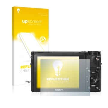 Vorderseite einer Produktverpackung mit dem Markenlogo upscreen. Daneben ist das Gerät Sony Cyber-Shot DSC-RX100 V mit dem zug