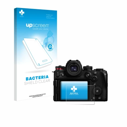 Vorderseite einer Produktverpackung mit dem Markenlogo upscreen. Daneben ist das Gerät Panasonic Lumix S1R II mit dem zugehöri